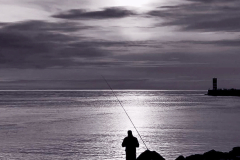 sea fishing at dusk